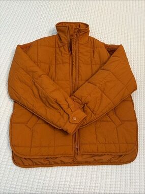 Women’s Quilted Puffer Jacket in Rust Orange